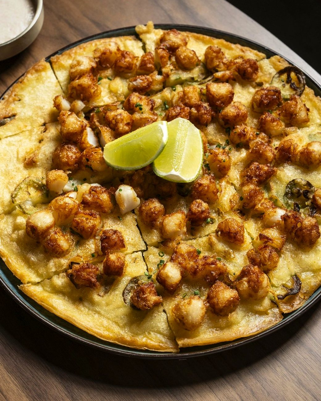 Crispy scallop pancake with mentaiko cream and lime